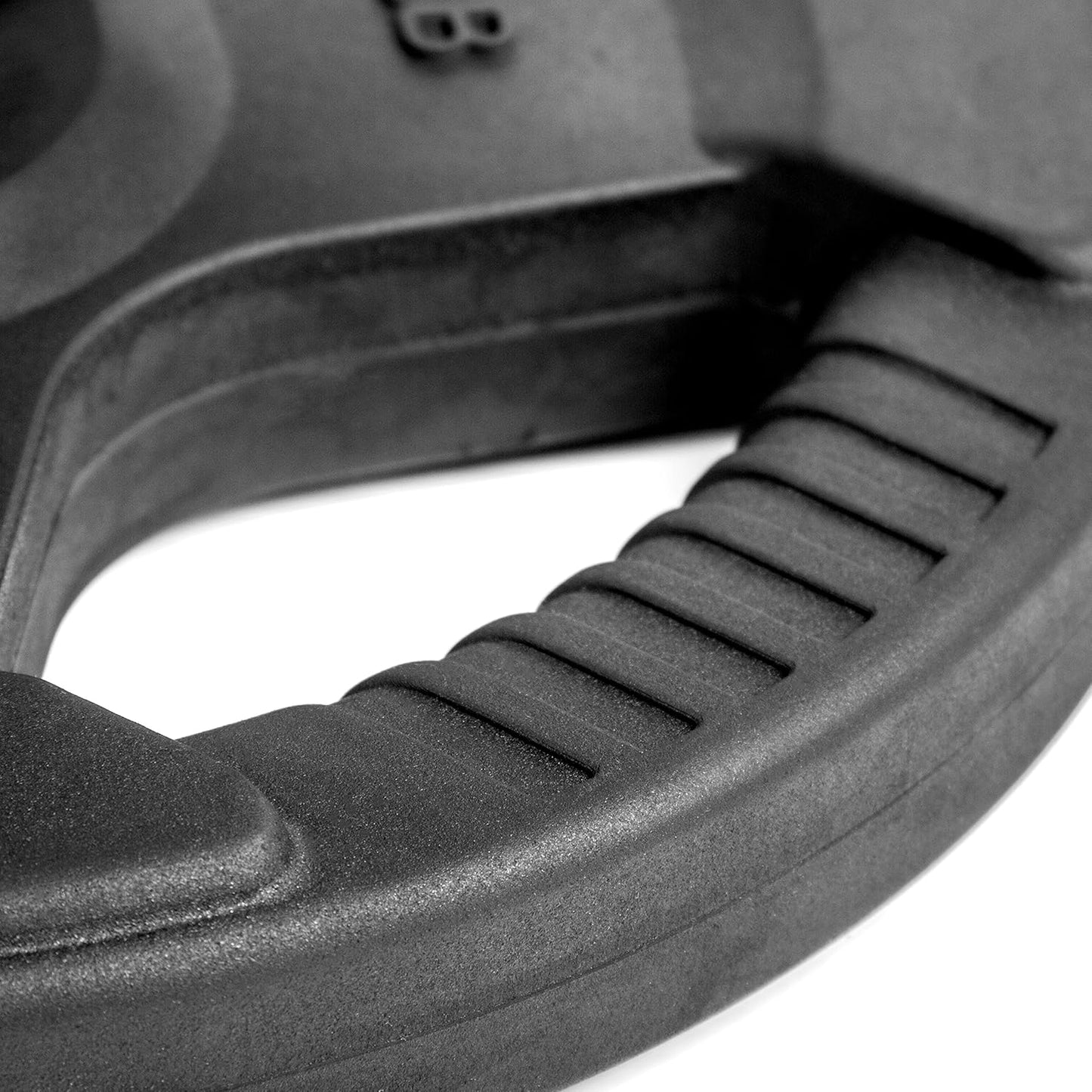 Close-up of tri‑grip handles on XMark Olympic plate