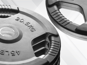 Multiple XMark Tri‑Grip plates in different weight sizes