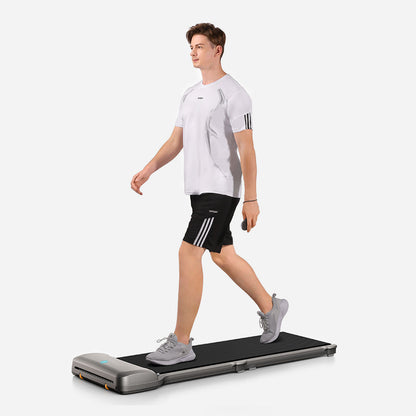 Person walking on the WalkingPad C1 Compact Foldable Treadmill for home