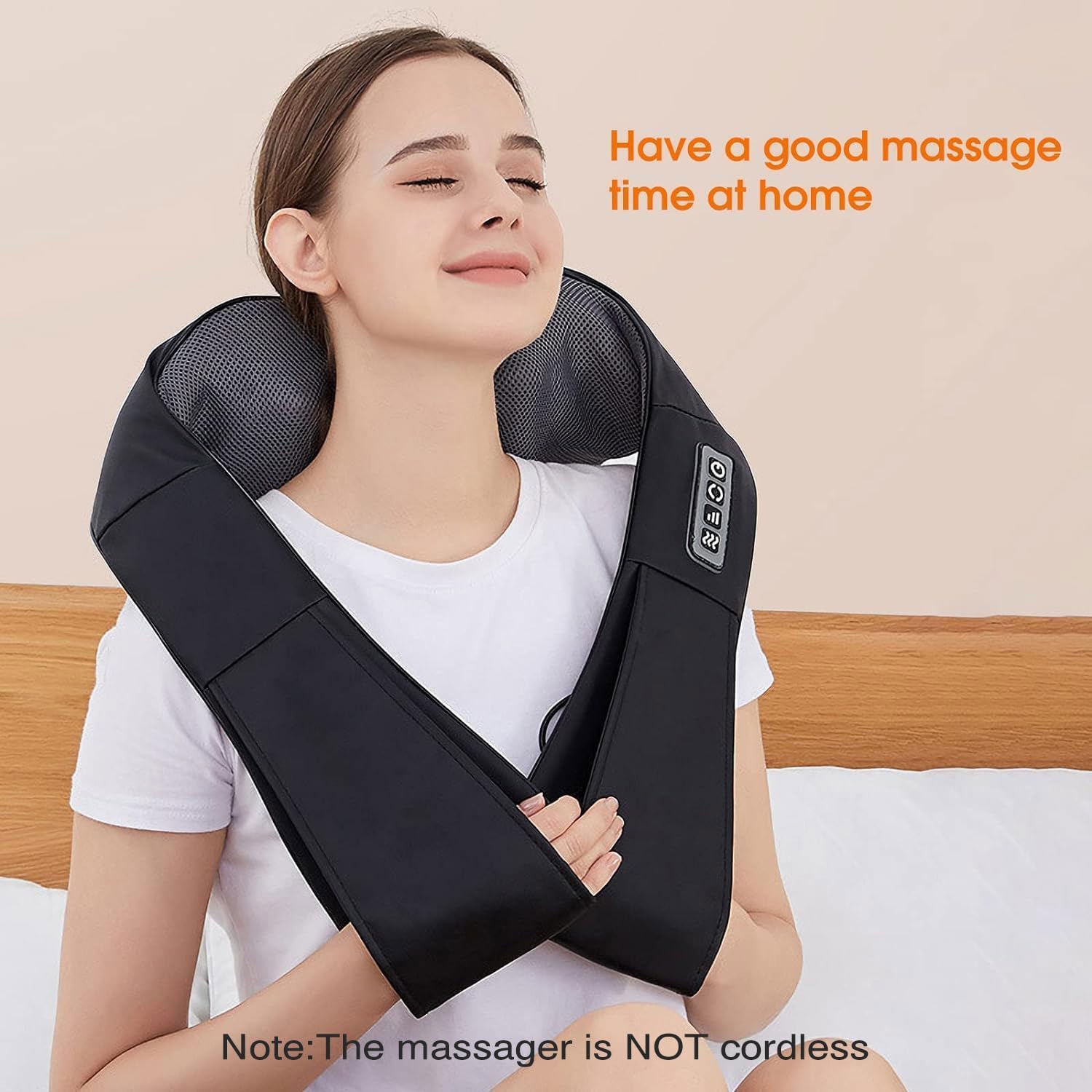 User relaxing with AERLANG Black Neck & Back Massager on shoulders
