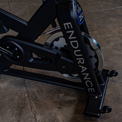 Close-up of 44 lb precision-balanced flywheel on Body-Solid Endurance ESB250 spin bike