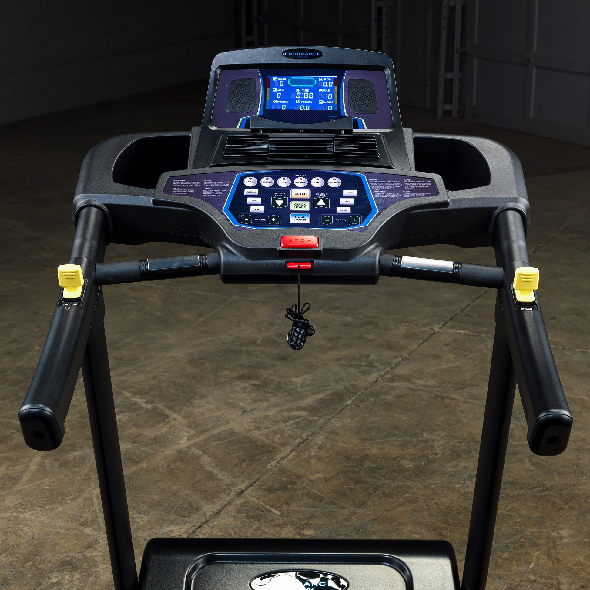 Close-up of LED display and control console on Body-Solid Endurance T150 with speed, distance, and incline settings