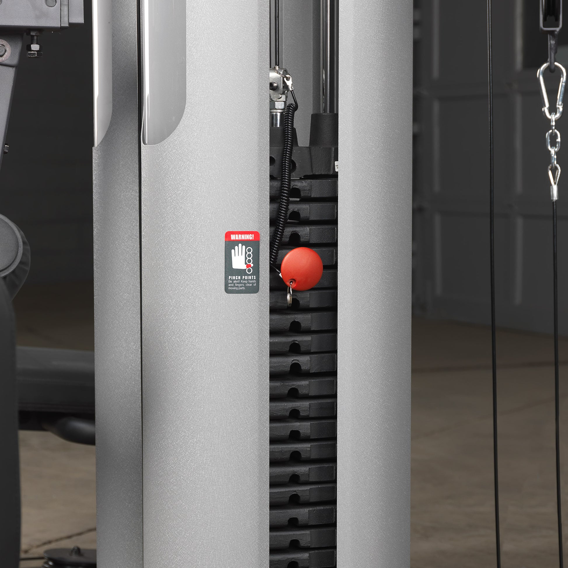 Close-up of the dual 210 lb weight stacks with selectorized plates on G9S