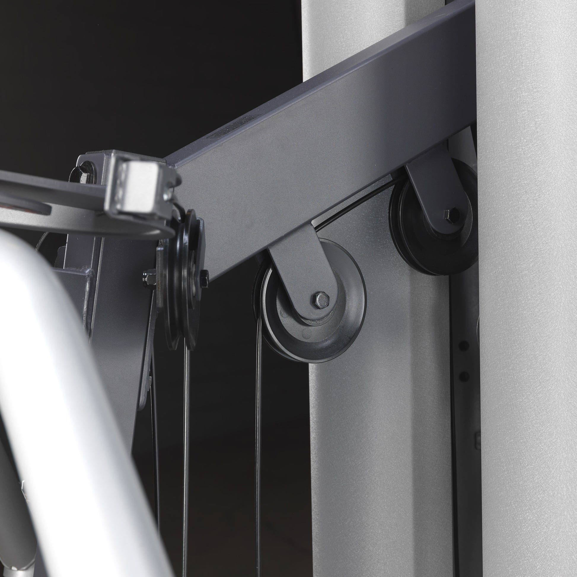 Close-up of pulley system with nylon-coated cables on the Body-Solid G9S Two Stack Gym
