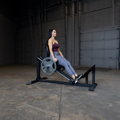 User performing calf raise on Body-Solid GCLP100