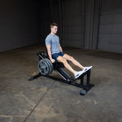 User performing leg press on Body-Solid GCLP100