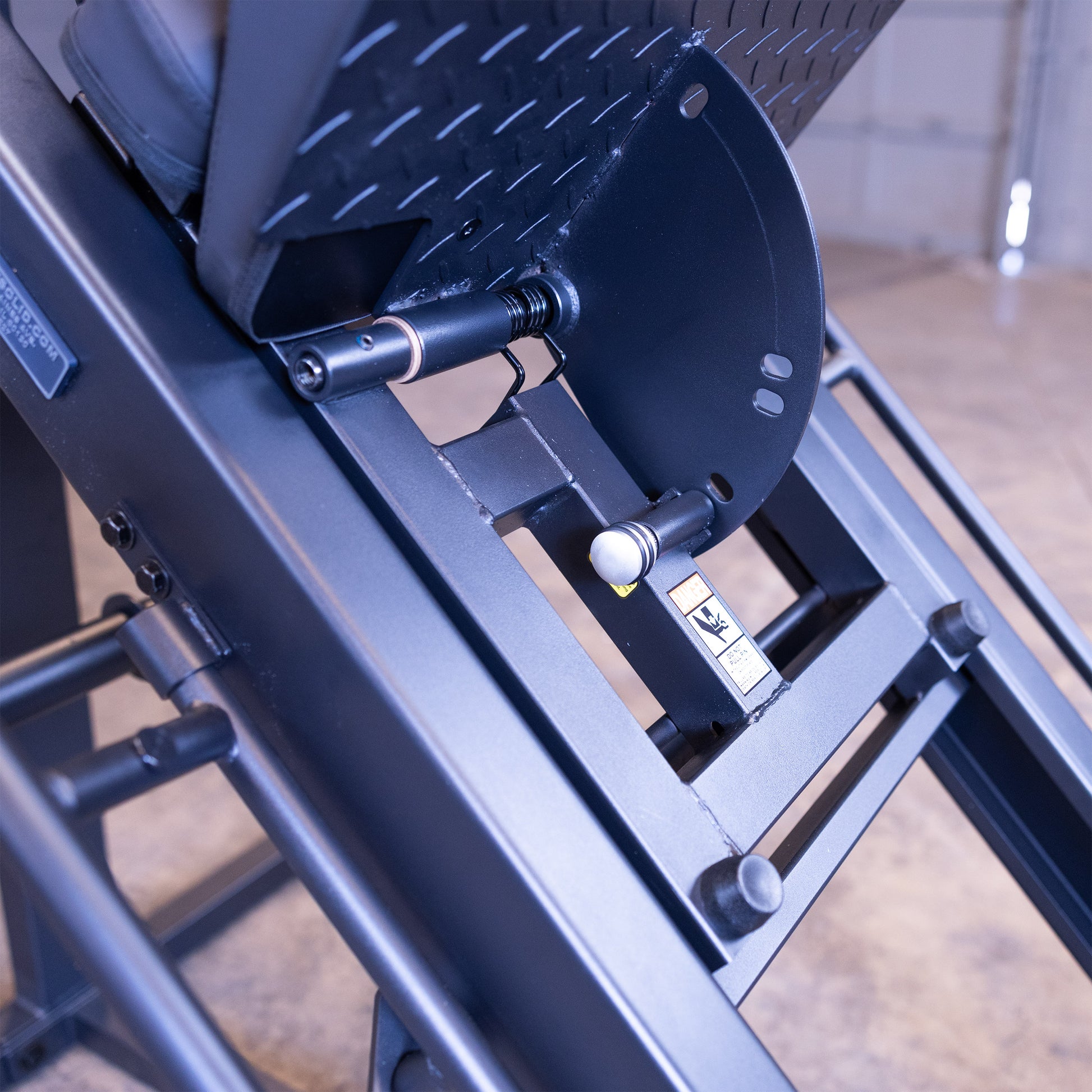 Lockout adjustment lever showing one of three positions on the GLPH1100B Leg Press