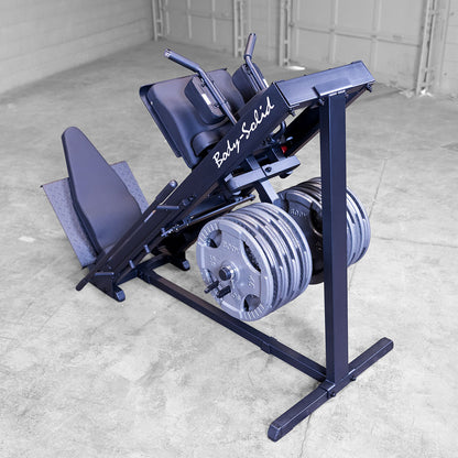 Full view of Body‑Solid GLPH1100B loaded with plates for leg press