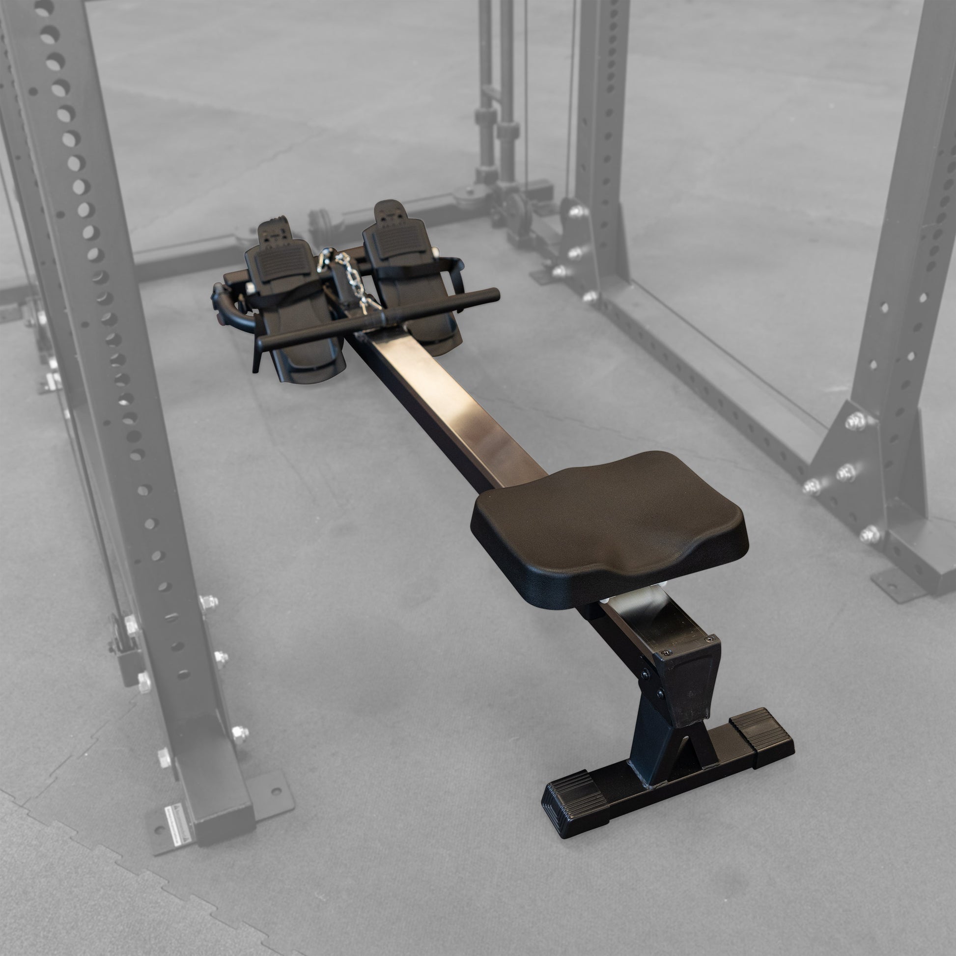 Body-Solid GROW rower attachment setup on power rack for rowing exercises