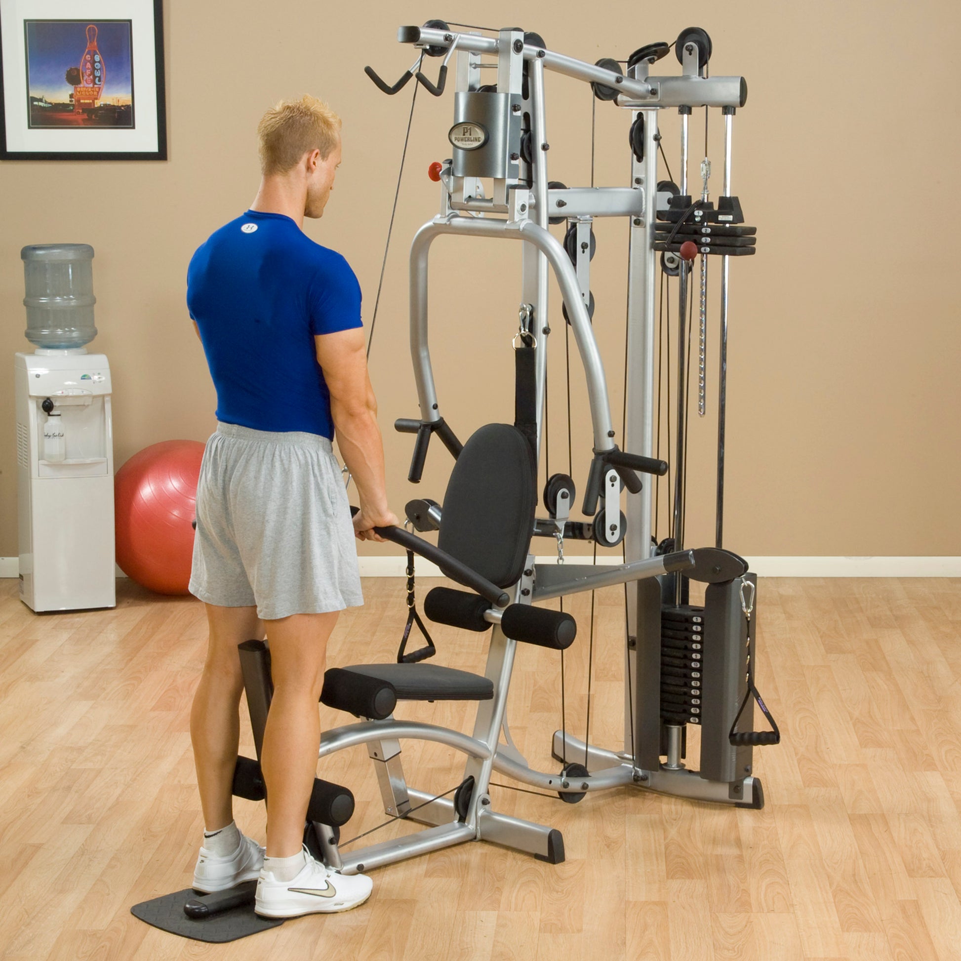 Back view of Body-Solid Powerline P2X Home Gym with lat pulldown station