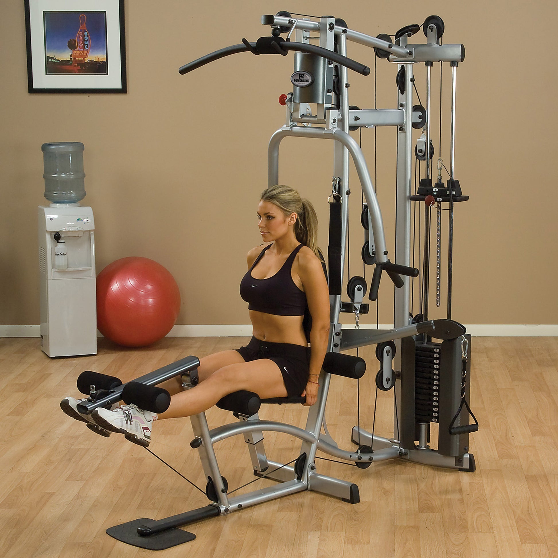 Body-Solid P2X Home Gym leg extension in use