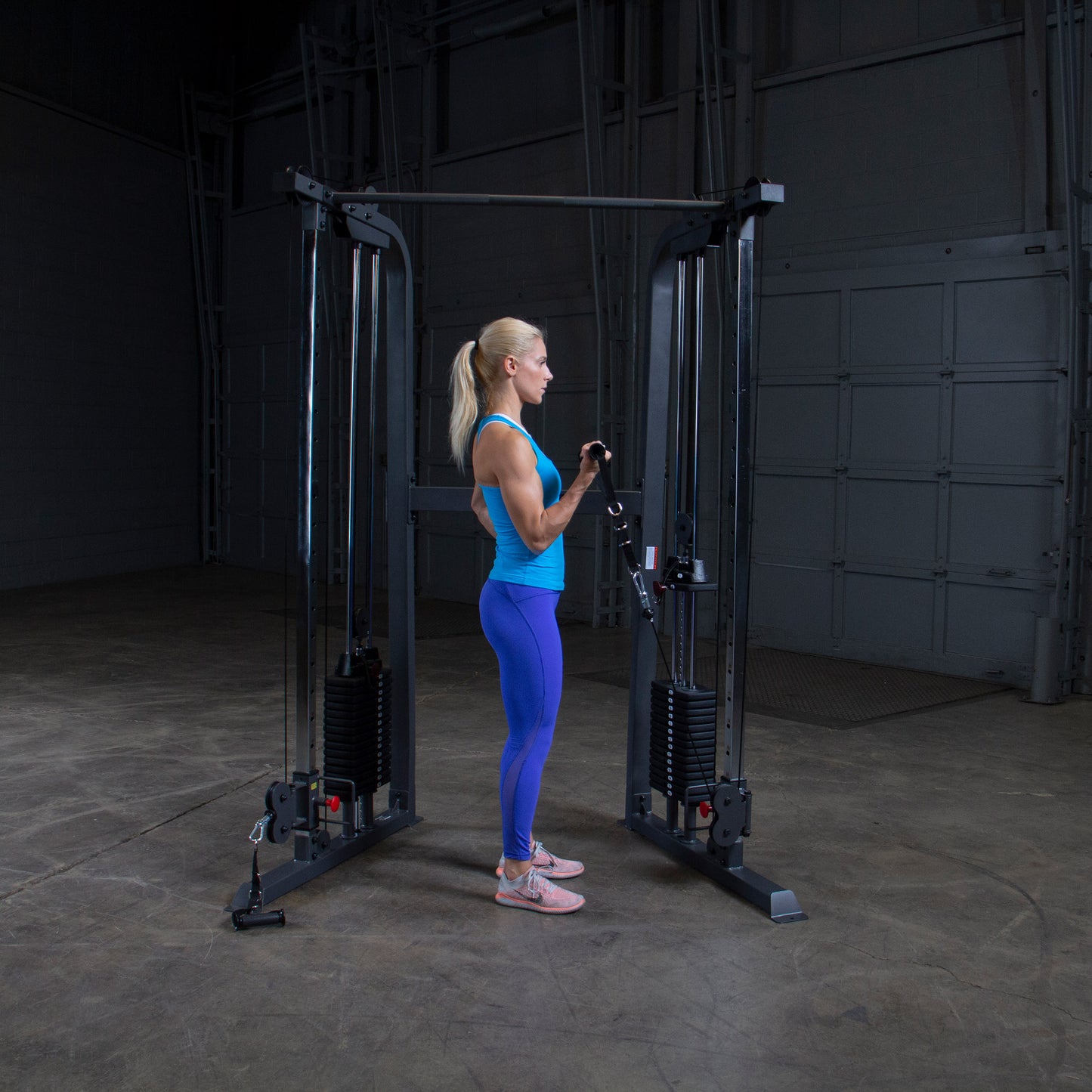 Heavy-duty commercial-grade frame on Body-Solid Powerline PFT100 Functional Trainer for durability and stability.