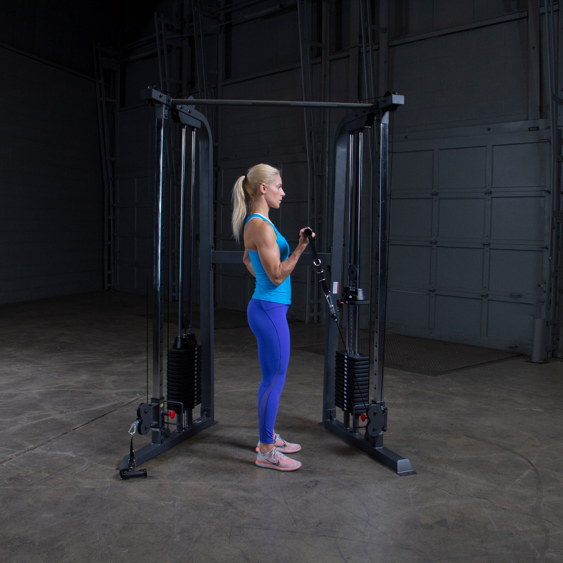 Heavy-duty commercial-grade frame on Body-Solid Powerline PFT100 Functional Trainer for durability and stability.