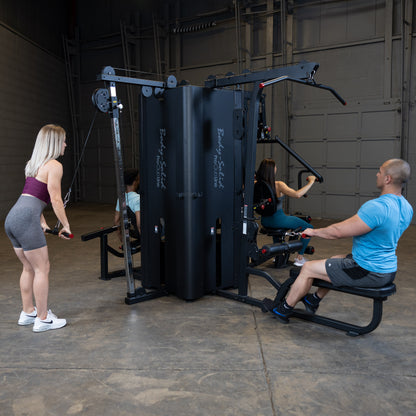 Four Users Training Simultaneously on Body-Solid S1000 4-Stack Gym