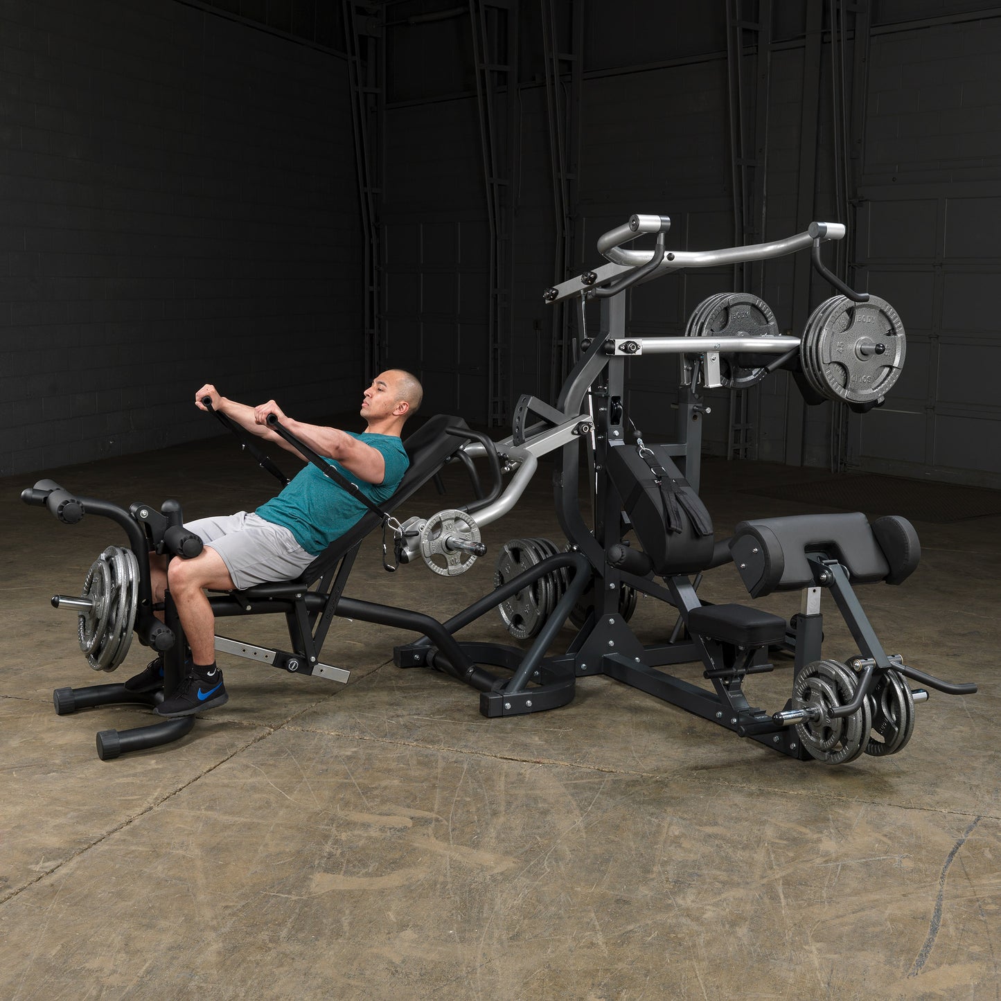 Side view of Body-Solid SBL460P4 Freeweight Leverage Gym with attachments