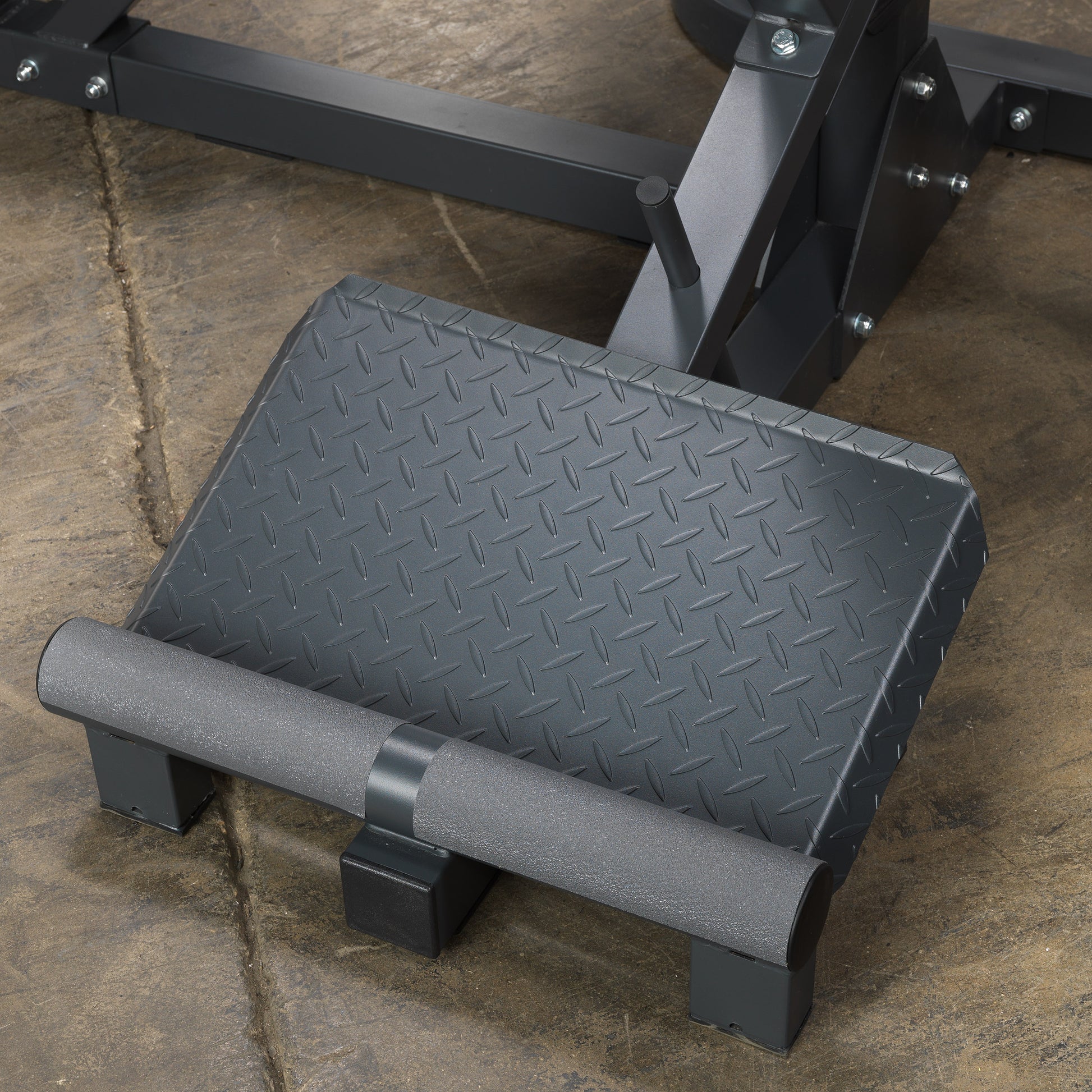 Non-slip footplate on Body-Solid SBL460P4 gym for secure leg workouts