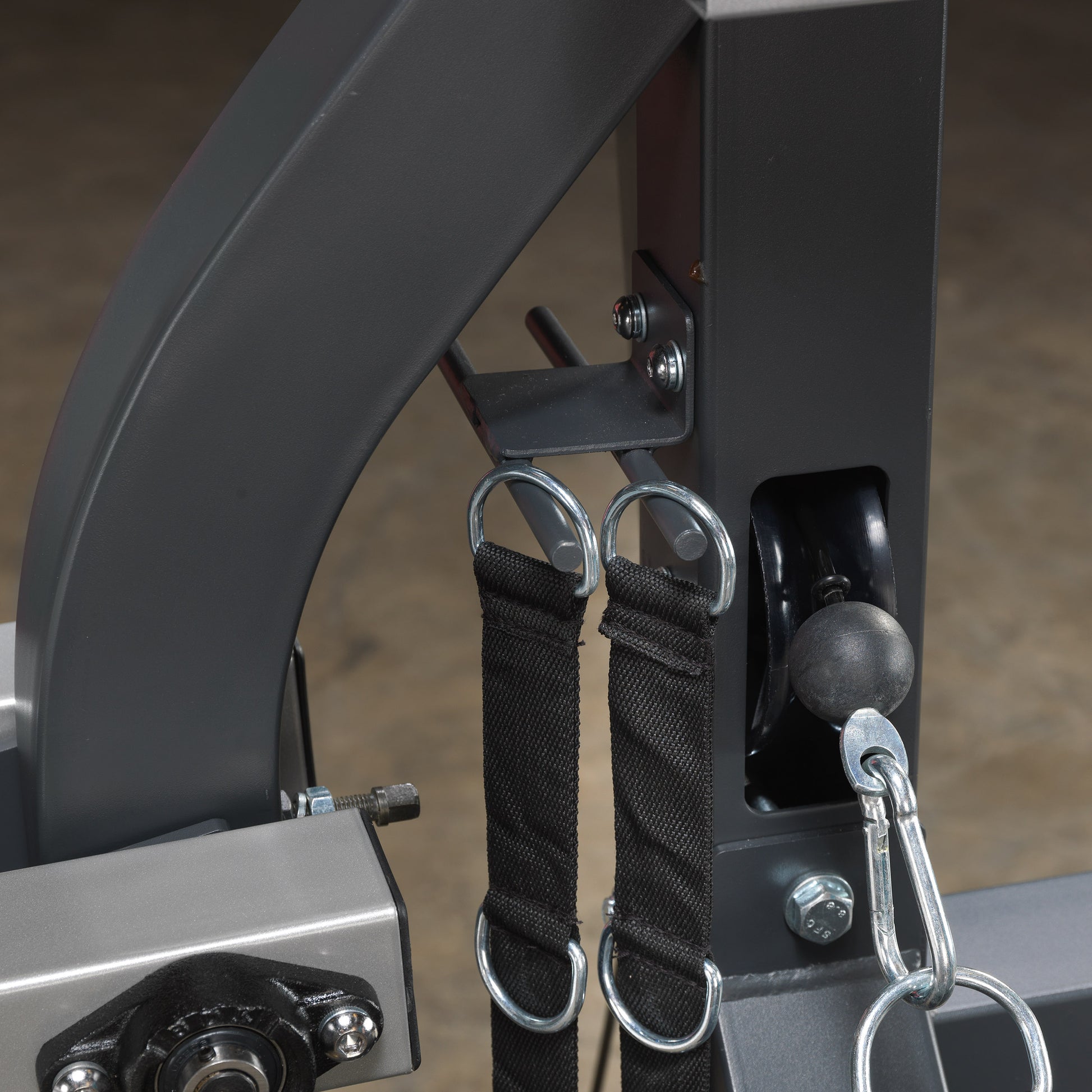 Safety locking pins on Body-Solid SBL460P4 leverage gym for secure adjustments