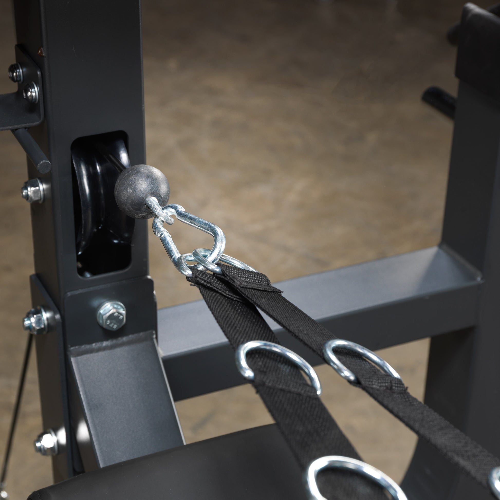 Safety locking pins on Body-Solid SBL460P4 leverage gym for secure adjustments