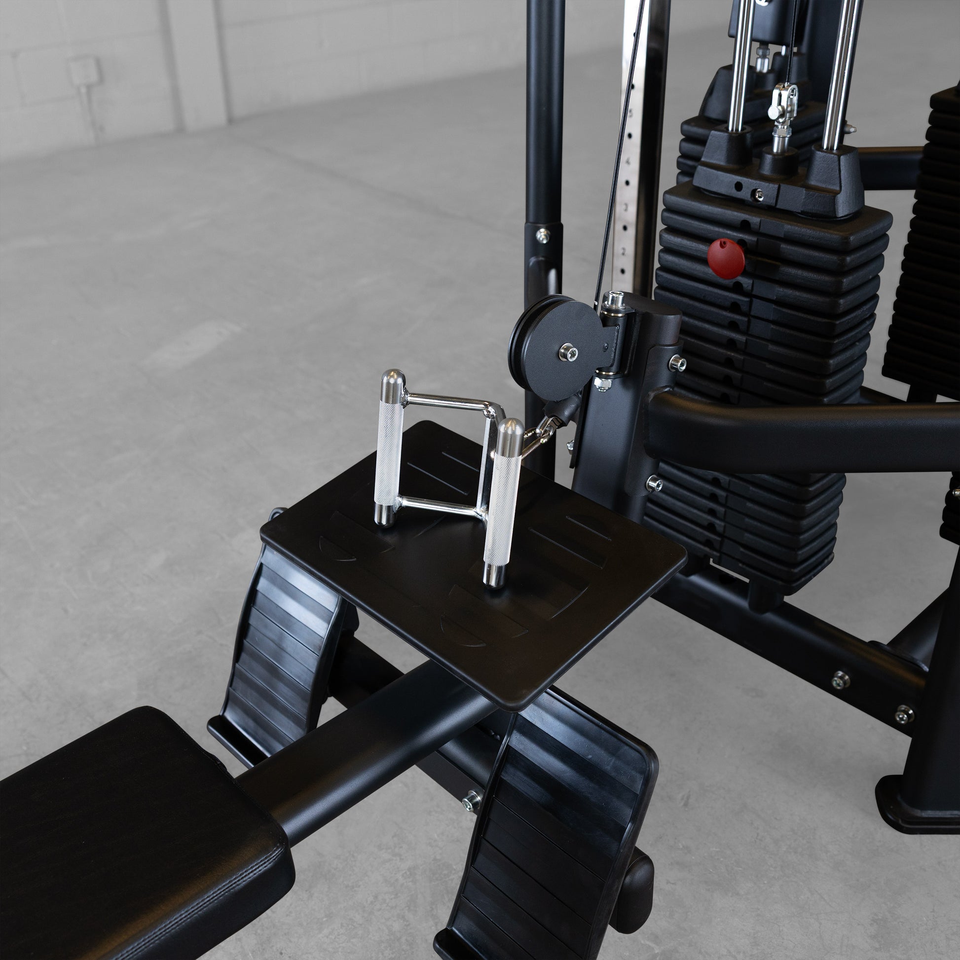 Low row cable workout station on Body-Solid SJG500 jungle gym