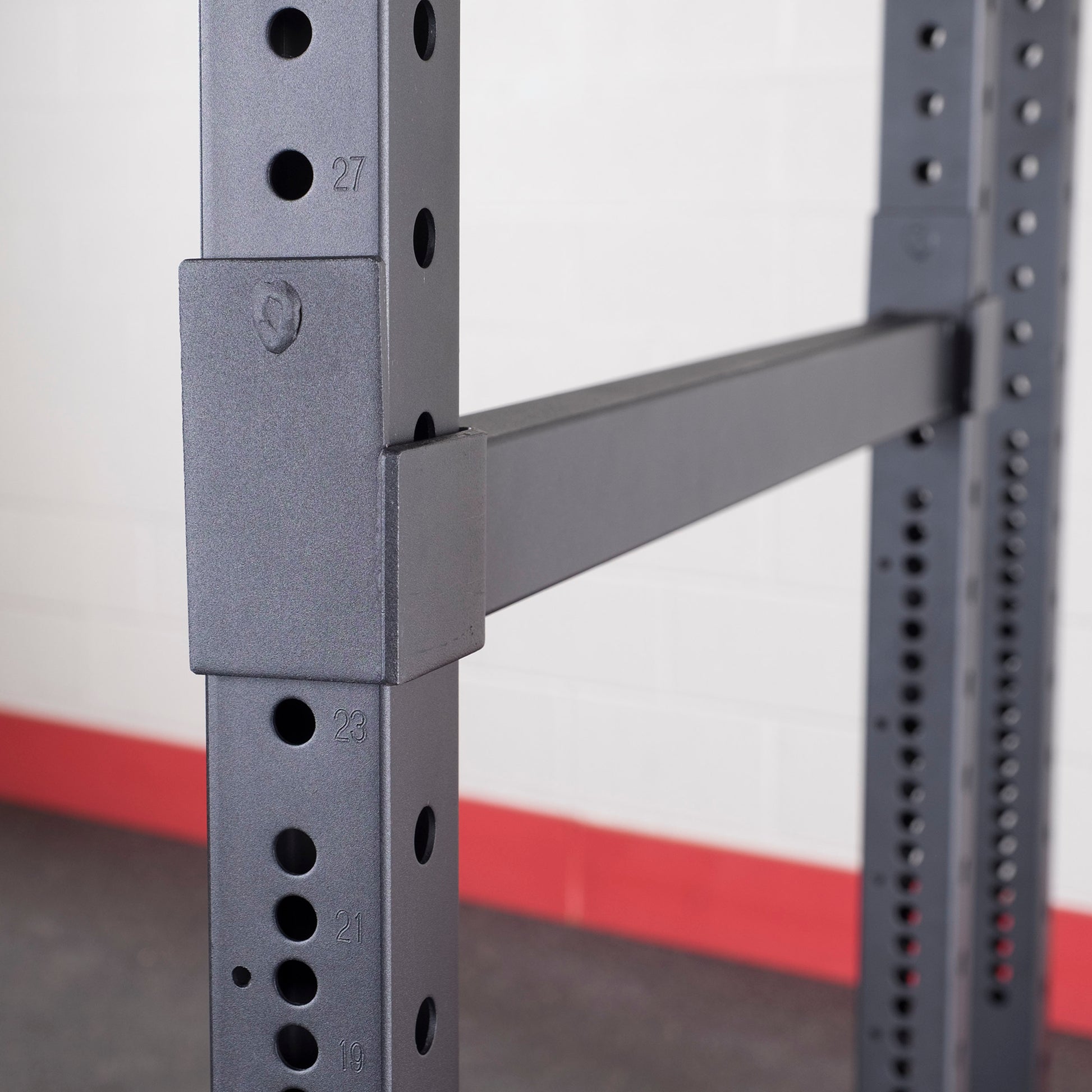 Close-up of textured powder-coated steel finish on rack frame