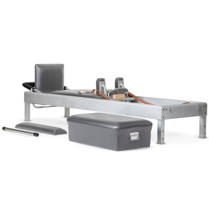 Included accessories for the Classic Aluminum Reformer—box, jumpboard, straps, handles, and springs.