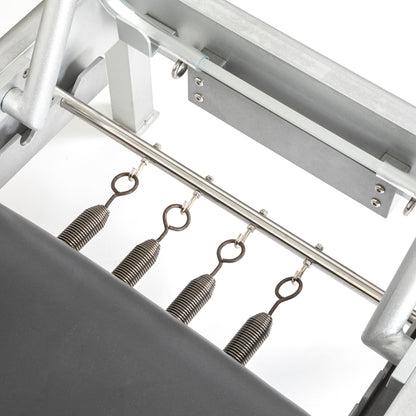 Detailed view of the resistance springs on the Elina Pilates Classic Aluminum Reformer
