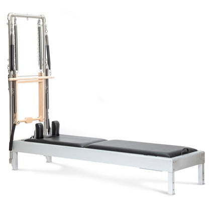 Elina Pilates Classic Aluminum Reformer 86″ with integrated tower, polished aluminum and black upholstery, front view.