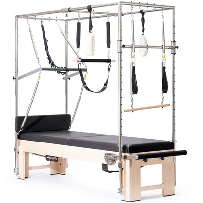 Stainless steel trapeze tower with padded trapeze bar and pulleys on the Elina Pilates Cadillac Reformer