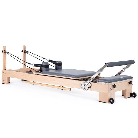Full view of the Elina Pilates Wooden Reformer Lignum™ Bundle with beechwood frame and accessories