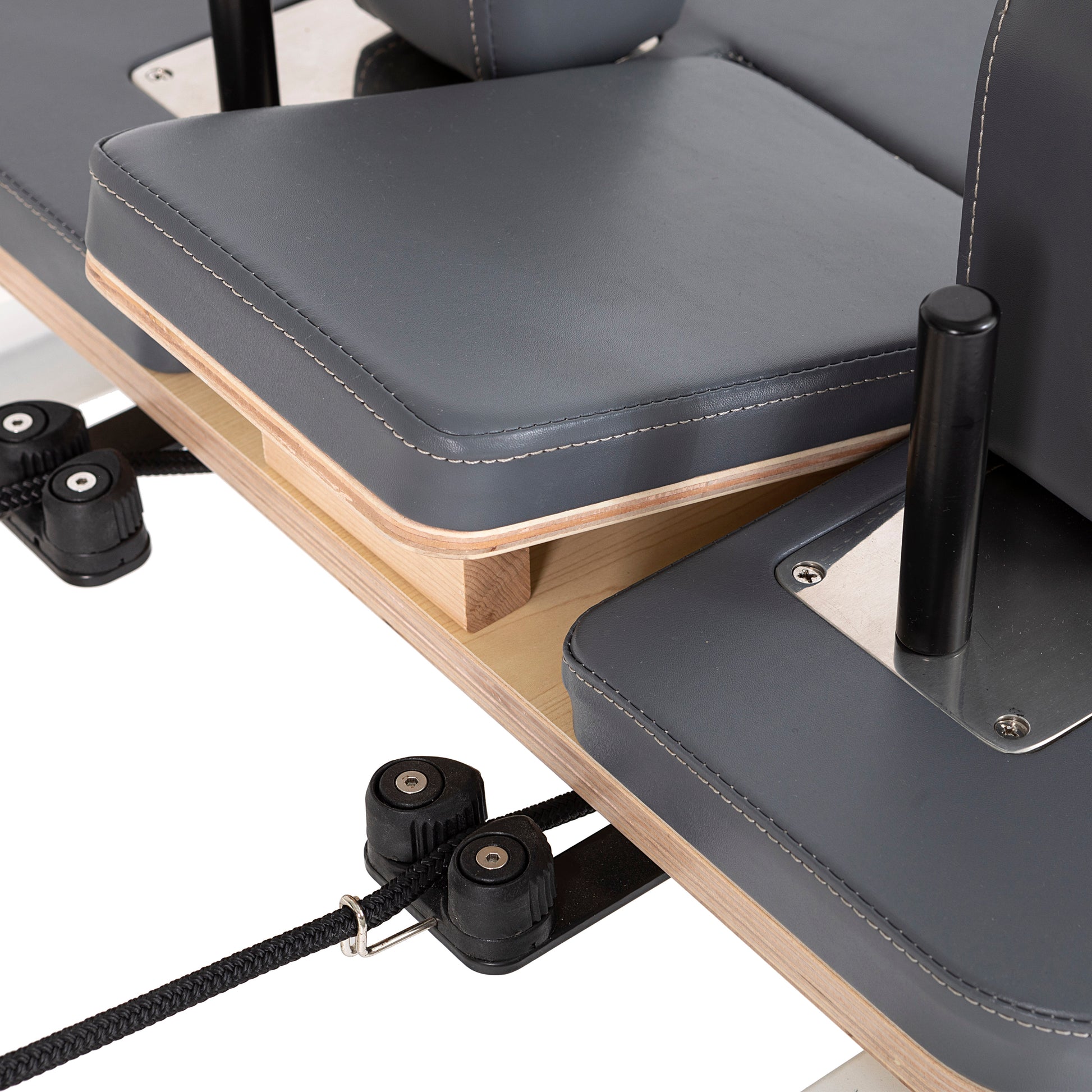 Detail of height-adjustable rope pulley system on the Elina Pilates Wooden Reformer Lignum™