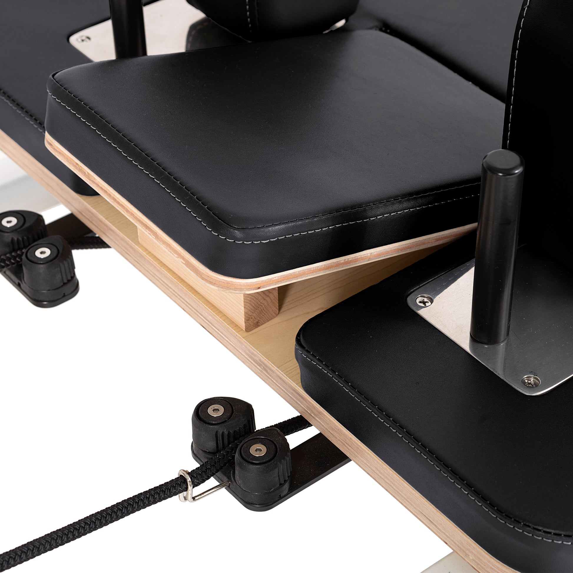 Detail of height-adjustable rope pulley system on the Elina Pilates Wooden Reformer Lignum™