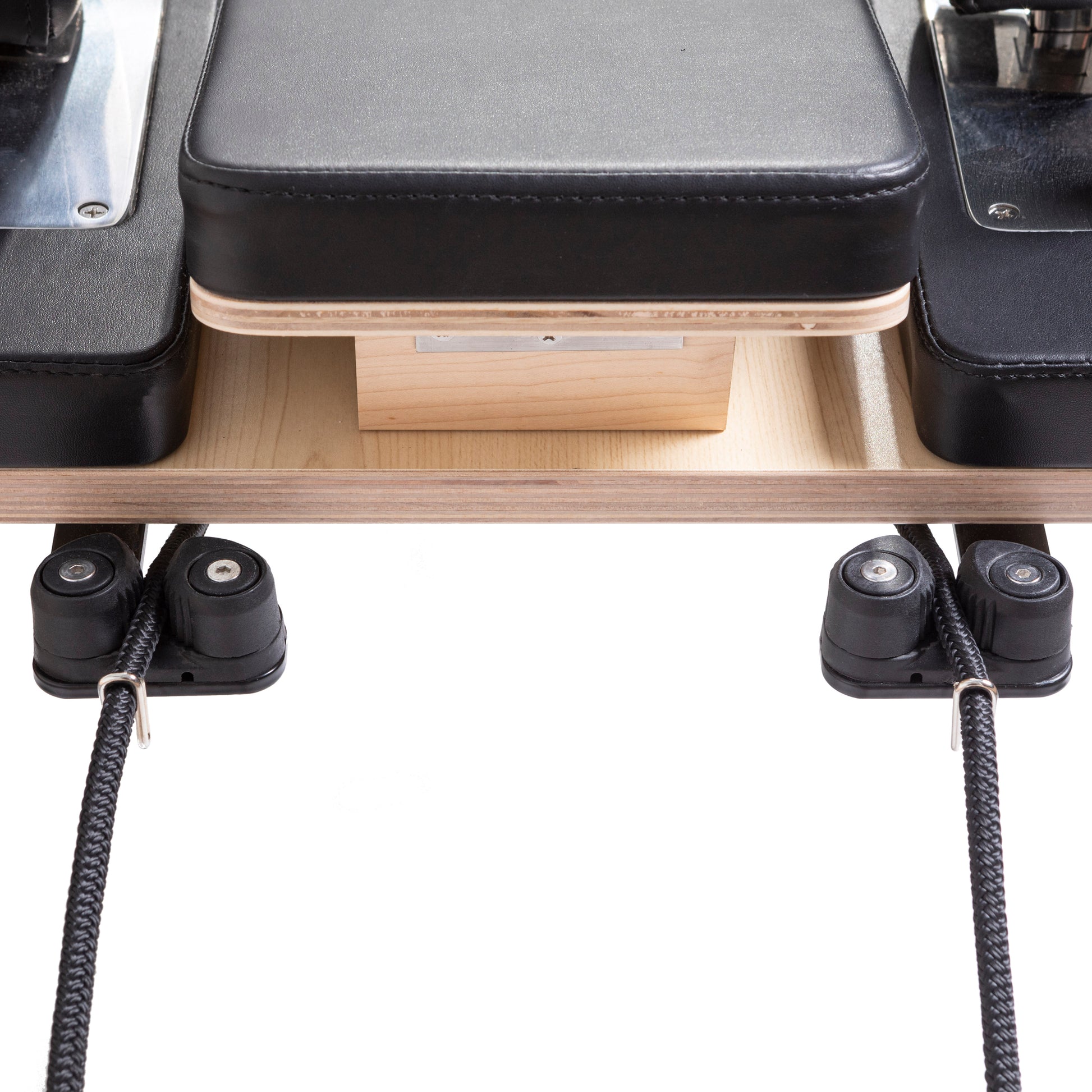 Ultra-quiet carriage with eight wheels and retractable rope system on Master Instructor™ Reformer