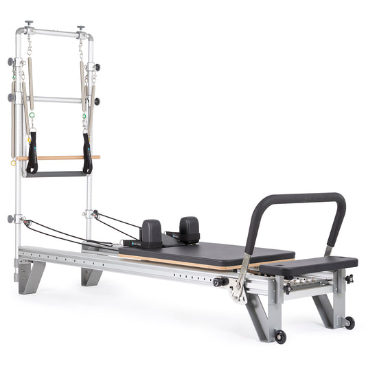 Full view of the Elina Pilates Mentor Reformer with Full Tower in black upholstery