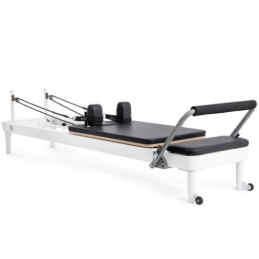 Full view of the Elina Pilates Nubium Reformer showcasing the sleek aluminum frame and black upholstery