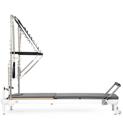 Elina Pilates Nubium™ Reformer with Tower Bundle in Grey — full side view showing sleek black aluminum frame and vertical storage design