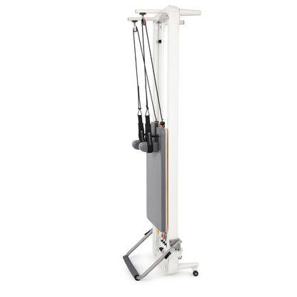 Elina Pilates Nubium Reformer shown stored vertically to save space in a modern Pilates studio