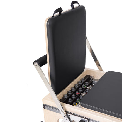 Adjustable quick-release footbar on the Elina Pilates Physio Reformer Master Instructor with Tower in black upholstery