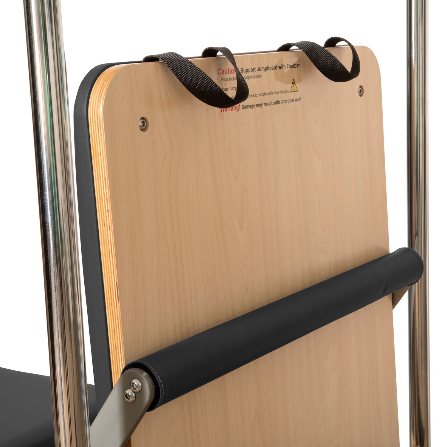 Close-up of padded carriage and headrest on the Elina Pilates Cadillac Reformer