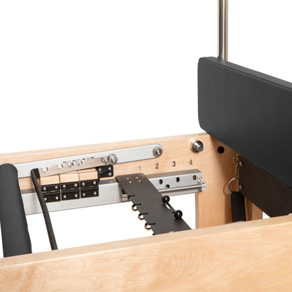 Adjustable push-through bar and springs attached to the Cadillac tower