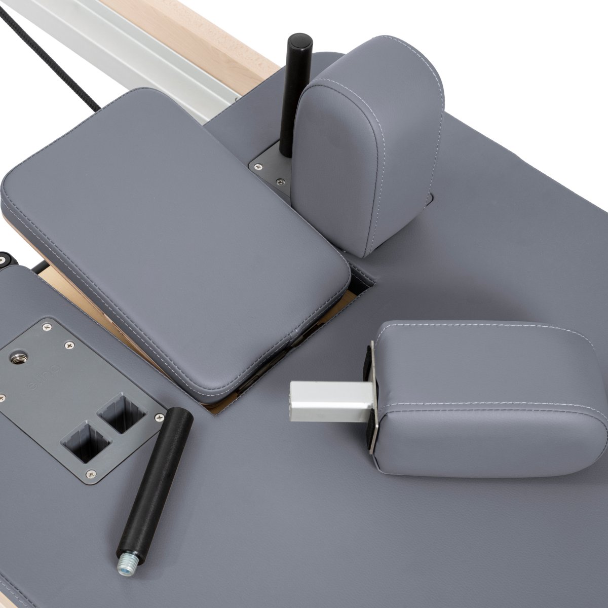 Close-up of adjustable shoulder pads on Elina Pilates Reformer