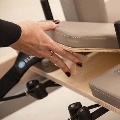 Padded shoulder rests with premium black upholstery on the Master Instructor™ Pilates Reformer for enhanced comfort