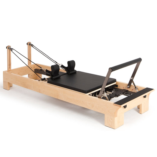 Elina Pilates Wood Reformer – full view of solid rock maple frame and carriage.