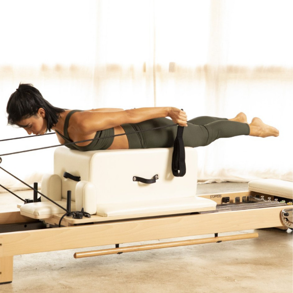 Elina Pilates Wooden Reformer Lignum with Tower with solid wood frame and stainless steel tower.