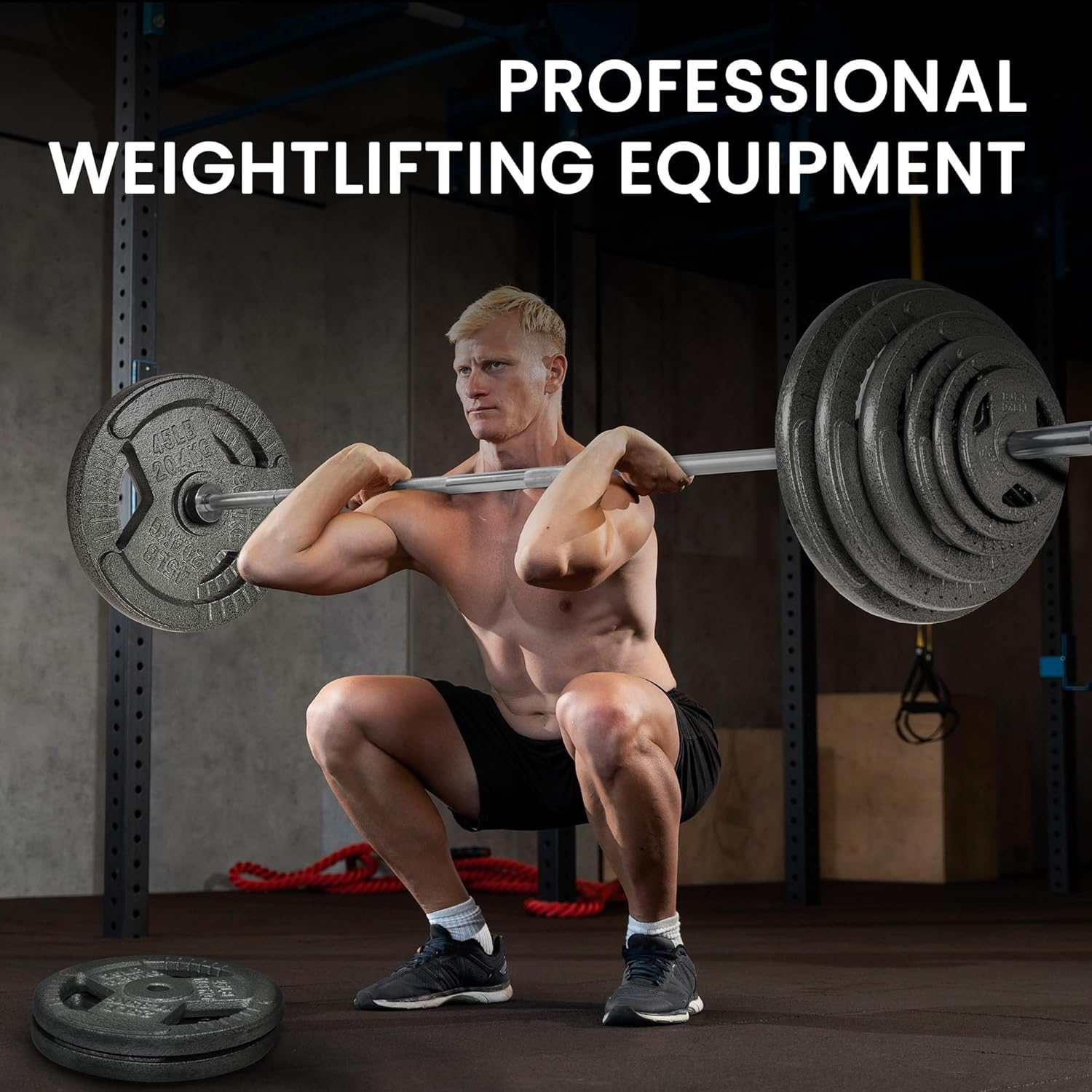 Fitvids Olympic Barbell in a home gym setup with weight plates