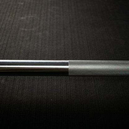 Close-up of precision knurling on Olympic bar