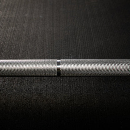 Close-up of precision knurling on Olympic bar