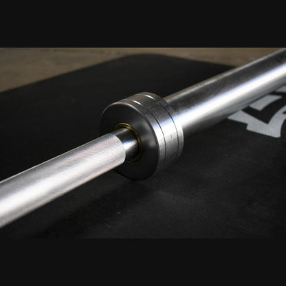 Triple bearing sleeve turning smoothly on Olympic bar