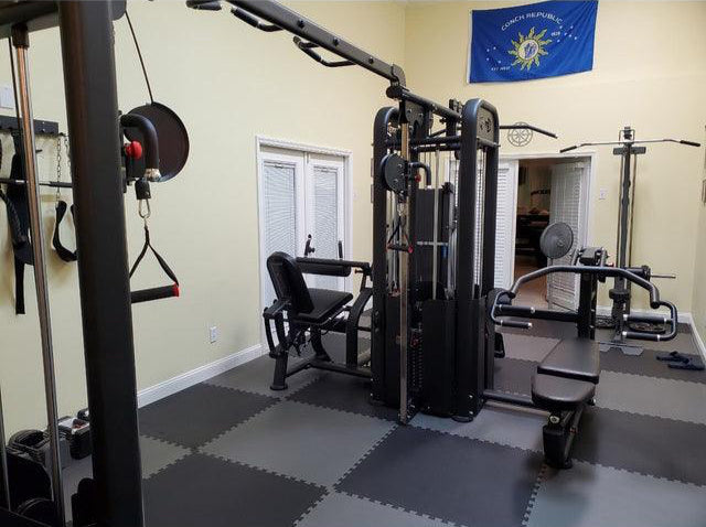 Lat pulldown and low row station in use