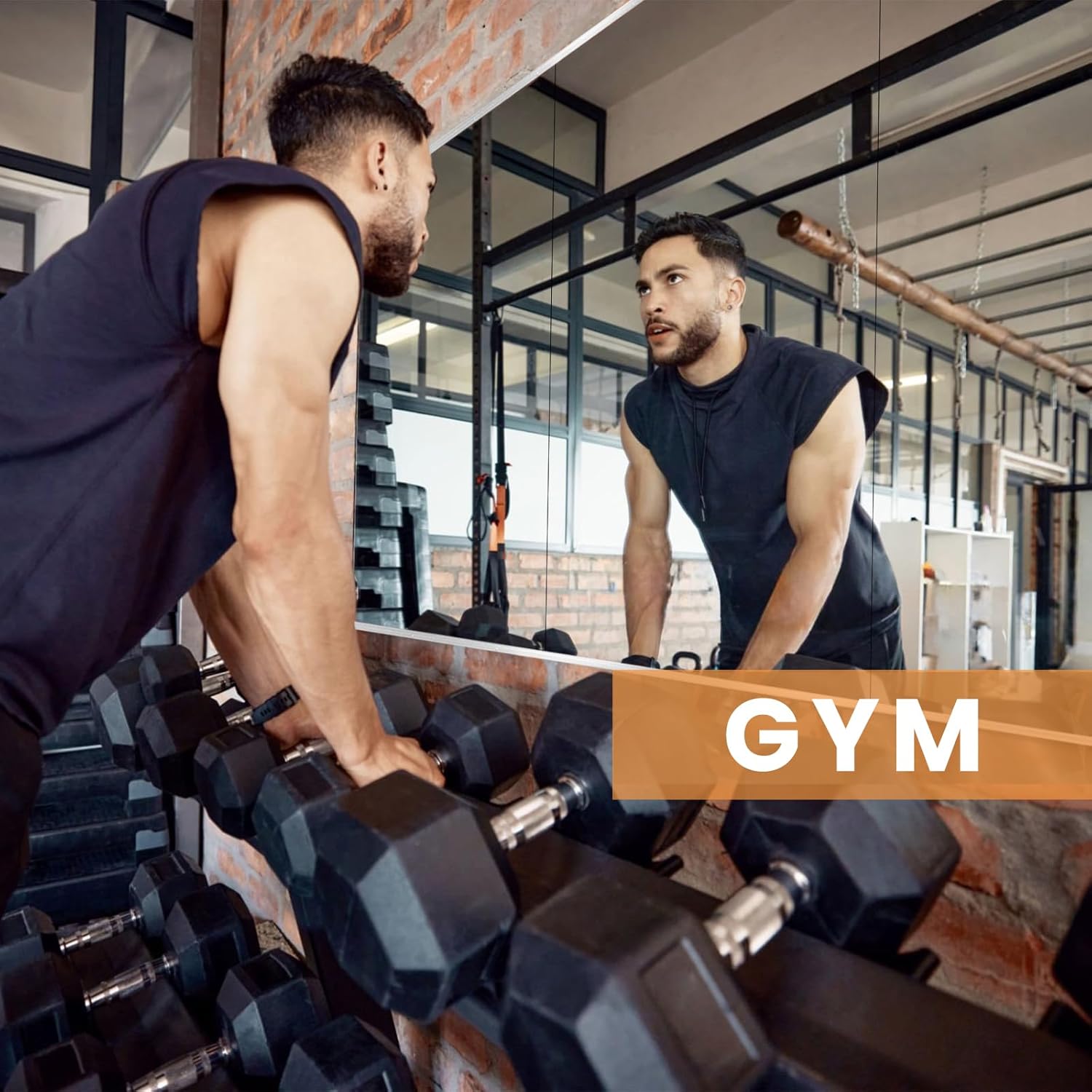 Pertetey mirror mounted in a home gym reflecting exercise equipment and workout space