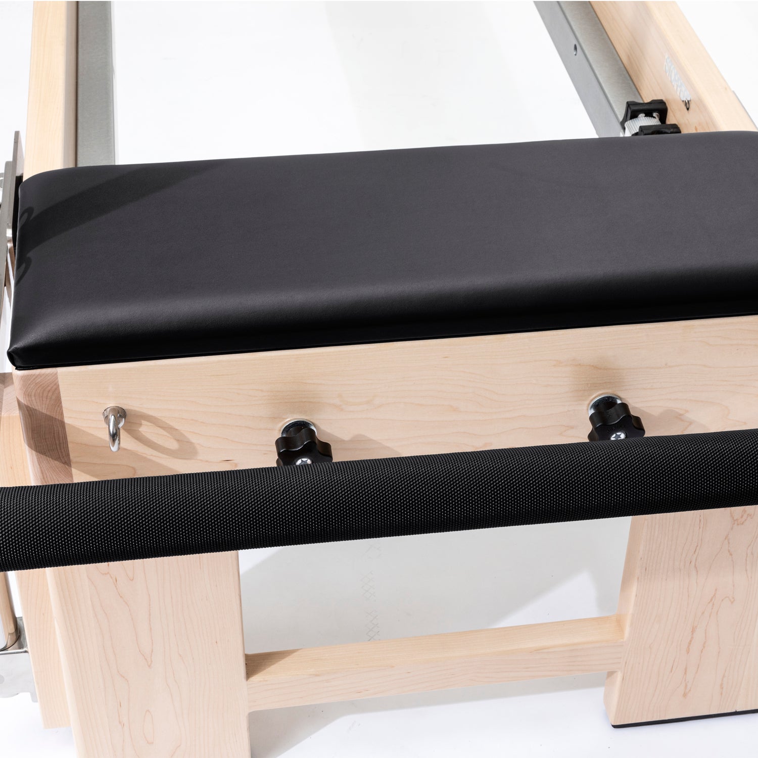 Professional Pilates Cadillac Reformer Elite with solid wood frame and black padding